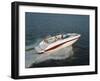 Three People in a Motorboat-null-Framed Photographic Print