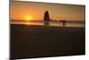 Three People Walk Along Cannon Beach, Oregon, at Sunset-Ben Coffman-Mounted Photographic Print