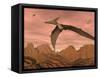 Three Pteranodon Dinosaurs Flying Above Rocky Landscape-null-Framed Stretched Canvas