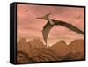 Three Pteranodon Dinosaurs Flying Above Rocky Landscape-null-Framed Stretched Canvas