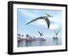 Three Pteranodons Flying over Landscape with Hills, Palm Trees and Water-null-Framed Art Print