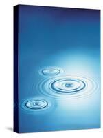 Three Rings in Blue Water with Bright Light Reflection-null-Stretched Canvas