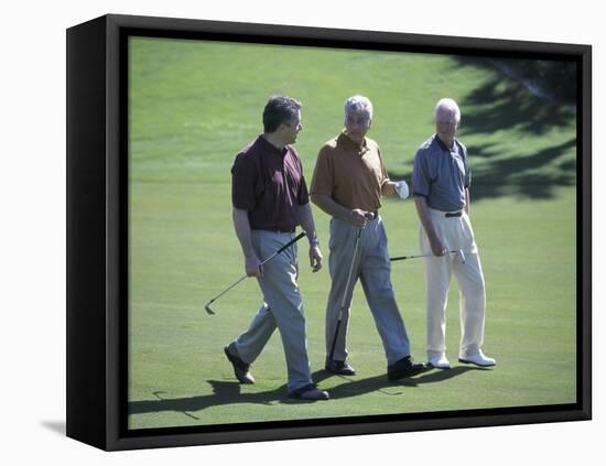 Three Senior Men Walking on a Golf Course-null-Framed Stretched Canvas