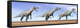 Three Suchomimus Dinosaurs Standing in the Desert-null-Framed Stretched Canvas