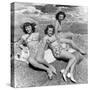 Three Teenage Girls (16-18) Sunbathing on Rocks, Portrait (B&W)-Hulton Archive-Stretched Canvas