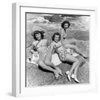 Three Teenage Girls (16-18) Sunbathing on Rocks, Portrait (B&W)-Hulton Archive-Framed Photographic Print