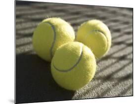 Three Tennis Balls-null-Mounted Photographic Print