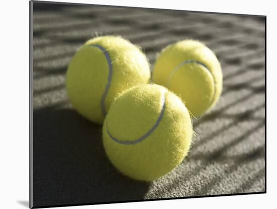 Three Tennis Balls-null-Mounted Photographic Print