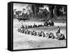 Three U.S. Marines Ride on a Truck Drawn Bomb Train at a Pacific Air Base, 1944-null-Framed Stretched Canvas