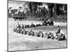 Three U.S. Marines Ride on a Truck Drawn Bomb Train at a Pacific Air Base, 1944-null-Mounted Photo