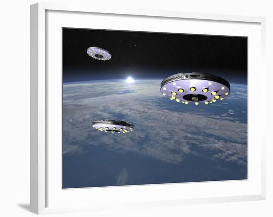 Three Ufo's Flying Above Planet Earth-null-Framed Art Print