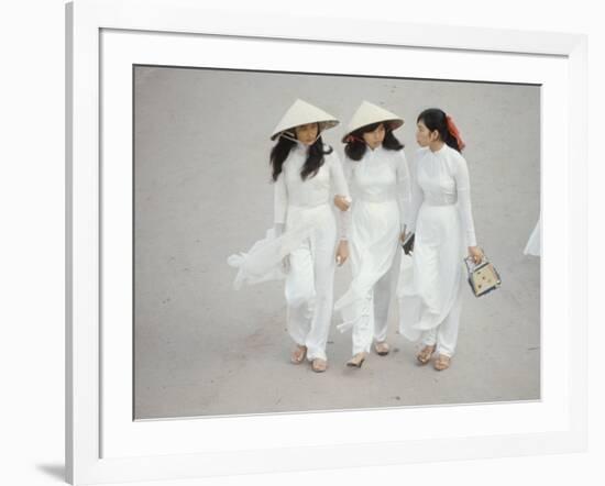 Three Vietnamese Young Women in White Fashion Walking Down the Street-Co Rentmeester-Framed Photographic Print
