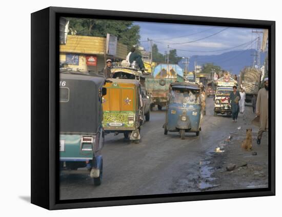 Three Wheeled Vehicles on Main Road, Mingora, Swat Valley, North West Frontier Province, Pakistan-David Poole-Framed Stretched Canvas