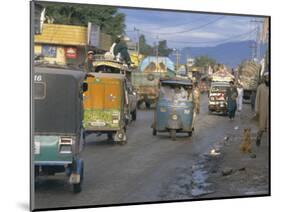 Three Wheeled Vehicles on Main Road, Mingora, Swat Valley, North West Frontier Province, Pakistan-David Poole-Mounted Photographic Print