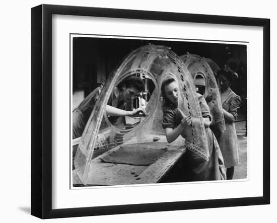 Three Women Assemble Aircraft Gun Turrets-null-Framed Art Print