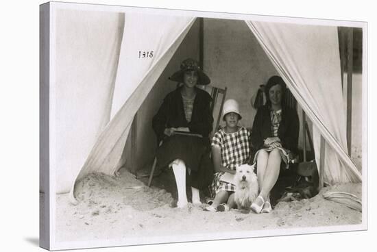 Three Women in a Tent on a Beach with a White Terrier-null-Stretched Canvas