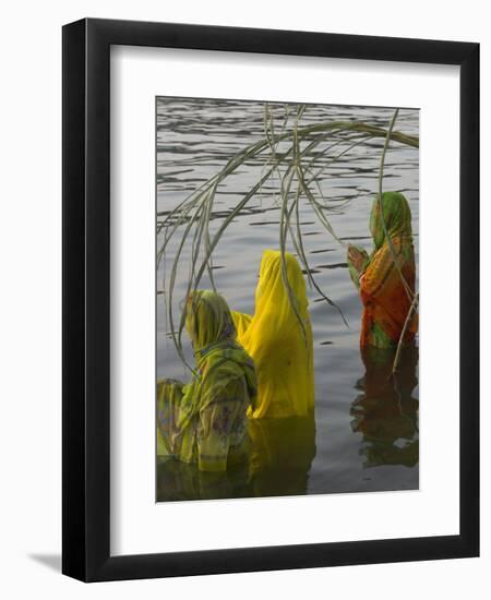 Three Women Pilgrims in Saris Making Puja Celebration in the Pichola Lake at Sunset, Udaipur, India-Eitan Simanor-Framed Photographic Print