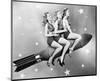 Three Women Sitting on Rocket-null-Mounted Art Print