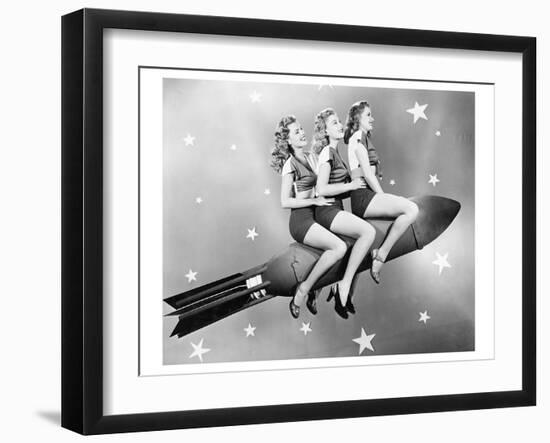 Three Women Sitting on Rocket-null-Framed Art Print