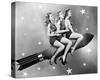 Three Women Sitting on Rocket-null-Stretched Canvas