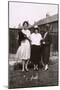 Three Women with a Dog and Tortoises in a Garden-null-Mounted Premium Photographic Print