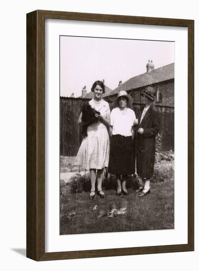 Three Women with a Dog and Tortoises in a Garden-null-Framed Photographic Print