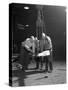 Three Workers from Edgar Allens Handle a Red Hot Billet, Sheffield, South Yorkshire, 1963-Michael Walters-Stretched Canvas