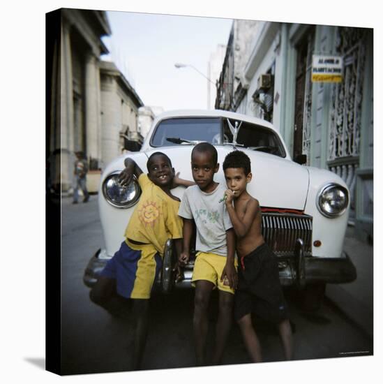 Three Young Boys Posing Against Old White American Car, Havana, Cuba, West Indies, Central America-Lee Frost-Stretched Canvas