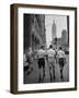 Three Young Businessmen Wearing Bermuda Shorts as They Walk Along Fifth Ave. During Lunchtime-Lisa Larsen-Framed Premium Photographic Print