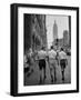 Three Young Businessmen Wearing Bermuda Shorts as They Walk Along Fifth Ave. During Lunchtime-Lisa Larsen-Framed Premium Photographic Print