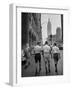Three Young Businessmen Wearing Bermuda Shorts as They Walk Along Fifth Ave. During Lunchtime-Lisa Larsen-Framed Premium Photographic Print