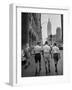 Three Young Businessmen Wearing Bermuda Shorts as They Walk Along Fifth Ave. During Lunchtime-Lisa Larsen-Framed Photographic Print