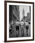 Three Young Businessmen Wearing Bermuda Shorts as They Walk Along Fifth Ave. During Lunchtime-Lisa Larsen-Framed Photographic Print