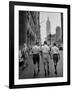 Three Young Businessmen Wearing Bermuda Shorts as They Walk Along Fifth Ave. During Lunchtime-Lisa Larsen-Framed Photographic Print