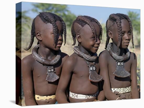 Three Young Girls, their Bodies Lightly Smeared with Red Ochre Mixture, Namibia-Nigel Pavitt-Stretched Canvas