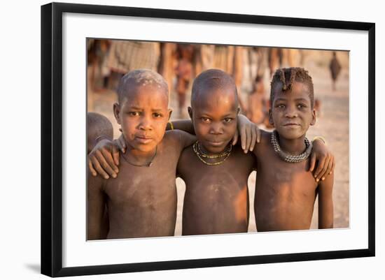 Three young Himba buddies, Opuwo, Namibia.-Wendy Kaveney-Framed Photographic Print