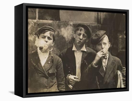 Three Young Newsboys Smoking, Saint Louis, Missouri, USA, circa 1910-Lewis Wickes Hine-Framed Stretched Canvas