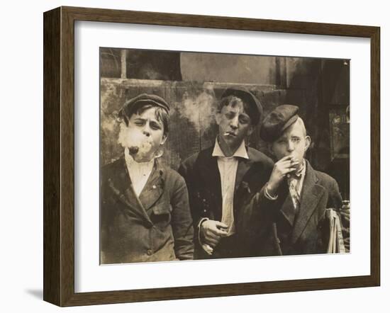 Three Young Newsboys Smoking, Saint Louis, Missouri, USA, circa 1910-Lewis Wickes Hine-Framed Photographic Print