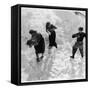 Three Young People Enjoying a Snow Fight-null-Framed Stretched Canvas