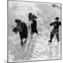 Three Young People Enjoying a Snow Fight-null-Mounted Photographic Print