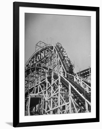 Thrill Seekers at the Top of the Cyclone Roller Coaster at Coney Island Amusement Park-Marie Hansen-Framed Photographic Print