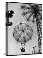 Thrillseeking Couple Take a Ride on the 300-Ft. Parachute Jump at Coney Island Amusement Park-null-Stretched Canvas