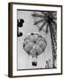 Thrillseeking Couple Take a Ride on the 300-Ft. Parachute Jump at Coney Island Amusement Park-null-Framed Photographic Print