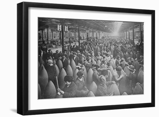 Throngs of Women Interspersed Amongst Large Artillery Shells on a Factory Floor.-null-Framed Art Print