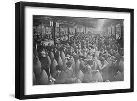 Throngs of Women Interspersed Amongst Large Artillery Shells on a Factory Floor.-null-Framed Art Print