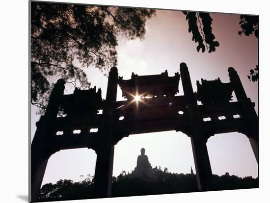 Tian Tan Buddhais Framed by a Chinese Gate at Ngong Ping-Andrew Watson-Mounted Photographic Print