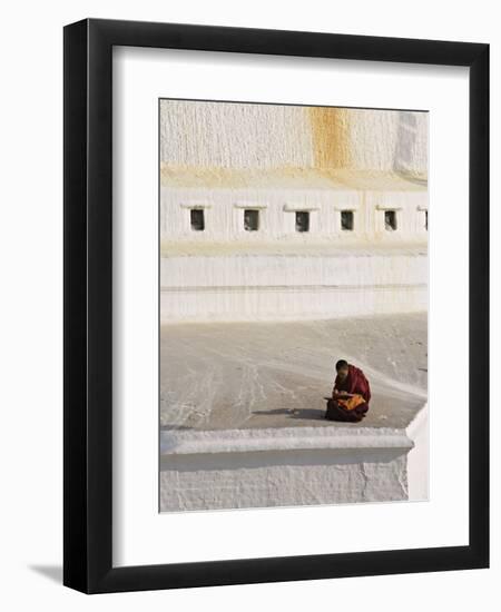 Tibetan Buddhist Monk Reading Scriptures at the Boudha Stupa at Bodhanath, Kathmandu, Nepal-Don Smith-Framed Photographic Print