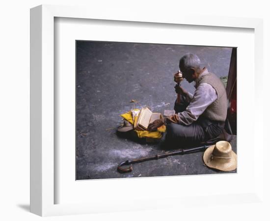 Tibetan Buddhist Pilgrim Reading Texts and Holding Prayer Wheel, Lhasa, China-Alison Wright-Framed Photographic Print