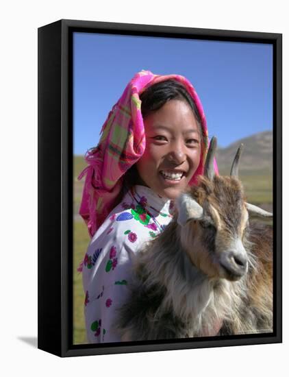 Tibetan Girl Holding Sheep in the Meadow, East Himalayas, Tibet, China-Keren Su-Framed Stretched Canvas