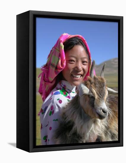 Tibetan Girl Holding Sheep in the Meadow, East Himalayas, Tibet, China-Keren Su-Framed Stretched Canvas